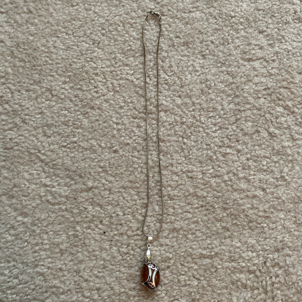 Sterling silver necklace with amber pendant